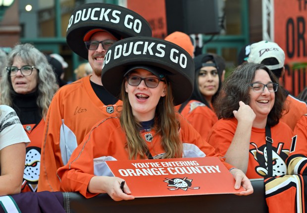 Zoey Flowers waits for Ducks players during the Orange Carpet...