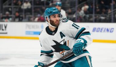 San Jose Sharks center Luke Kunin (11) in action against the Seattle Kraken during an NHL hockey game Thursday, Jan. 30, 2025, in Seattle.
