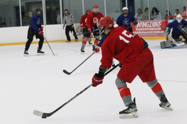 The ice hockey teams from Grosse Ile and Brownstown Woodhaven...