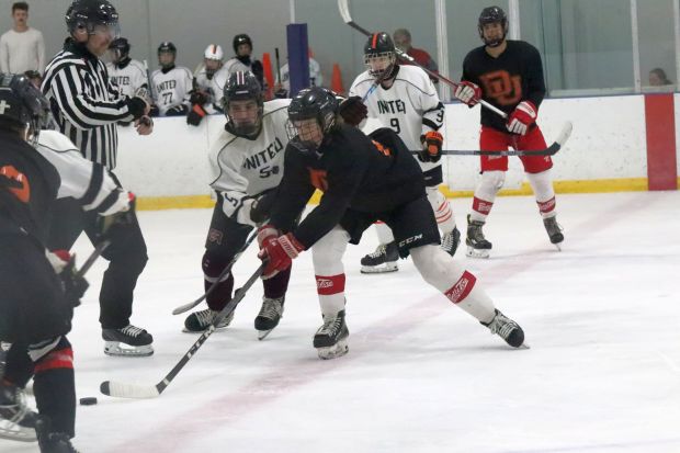 Rival programs Downriver Unified, black jerseys, and New Boston United squared off in a summer league contest at Kennedy Rec Center in Trenton on July 10, 2025. (SAMANTHA ELLIOTT -- For MediaNews Group)