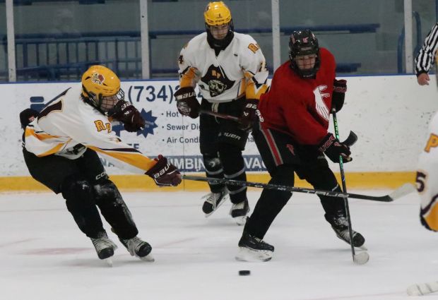 The Riverview-Cabrini United ice hockey team, white jerseys, battled Dearborn Divine Child in a summer league game at Kennedy Rec Center in Trenton on July 10, 2025. (SAMANTHA ELLIOTT -- For MediaNews Group)