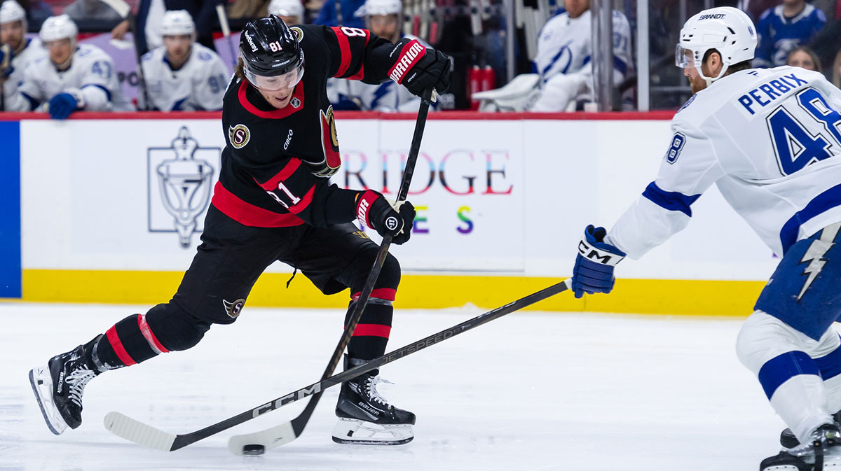 Ottawa Senators right wing Adam Gaudette (81) shoots the puck past Tampa Bay Lightning defenseman Nick Perbix (48) in the first period at the Canadian Tire Centre
