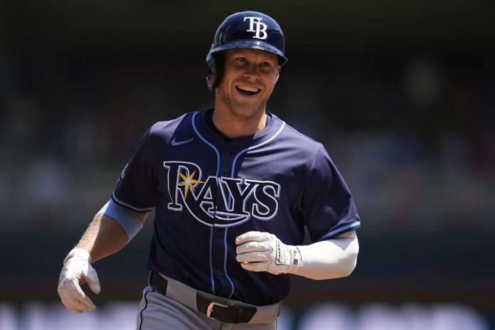 Tampa Bay Rays' Taylor Walls runs the bases after hitting a solo home run during the third inning of a baseball game against the Minnesota Twins, Sunday, July 6, 2025, in Minneapolis. (AP Photo/Abbie Parr)