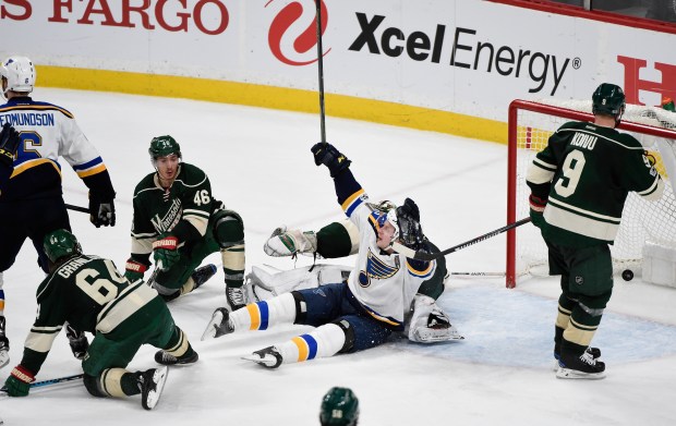 Vladimir Tarasenko #91 of the St. Louis Blues celebrates the game winning goal by teammate Joel Edmundson #6 as Mikael Granlund #64, Jared Spurgeon #46 and Mikko Koivu #9 of the Minnesota Wild look on after Game One of the Western Conference First Round during the 2017 NHL Stanley Cup Playoffs at Xcel Energy Center on April 12, 2017 in St Paul, Minnesota. The Blues defeated the Wild 2-1 in overtime. (Photo by Hannah Foslien/Getty Images)