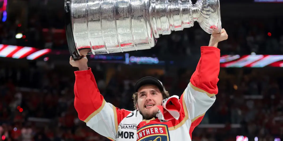 Mackie Samoskevich lifts the Stanley Cup after Florida defeats Edmonton in six games.