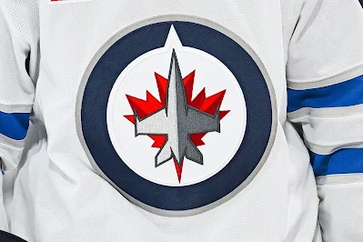 Winnipeg Jets jersey.