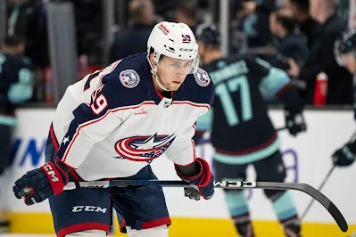Columbus Blue Jackets forward Yegor Chinakhov reacts during 2024 game.