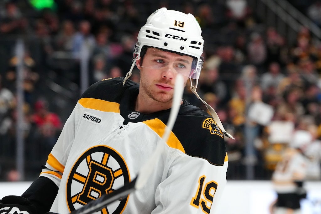 Mar 20, 2025; Las Vegas, Nevada, USA; Boston Bruins center John Beecher (19) warms up before a game against the Vegas Golden Knights at T-Mobile Arena. Mandatory Credit: Stephen R. Sylvanie-Imagn Images