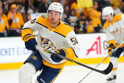 Nashville Predators forward Michael Bunting skates during 2025 game.