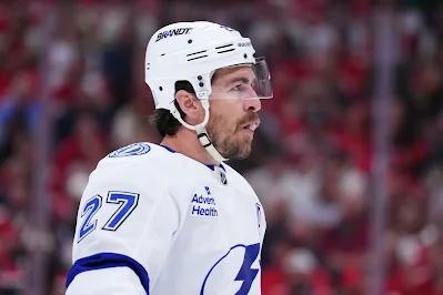 Tampa Bay Lightning defenseman Ryan McDonagh reacts during 2025 game.