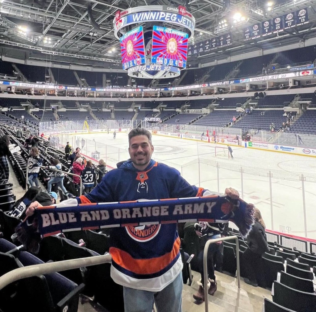 Islanders superfan Will Chiarucci attends a Jets game in Winnipeg.