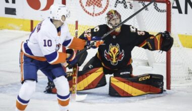 Wolf solid in net as Flames hang on for 2-1 shootout win over Islanders