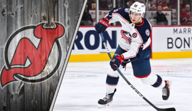 Yegor Chinakhov skates with the puck for the Columbus Blue Jackets amidst NHL trade rumors linking him to the New Jersey Devils.