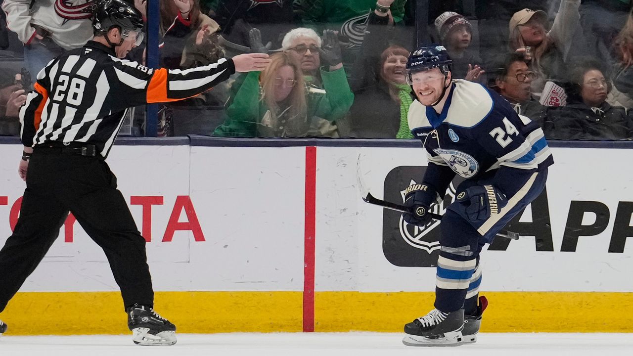 Columbus Blue Jackets right wing Mathieu Olivier (24) reacts after scoring in the third period of an NHL hockey game against the New Jersey Devils Monday, March 17, 2025, in Columbus, Ohio. (AP Photo/Sue Ogrocki)