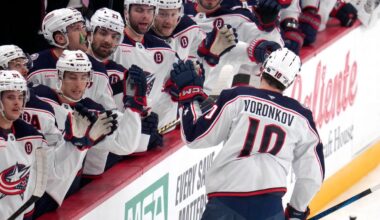 Columbus Blue Jackets' Dmitri Voronkov (10) returns to the bench after scoring during the first period of an NHL hockey game against the Pittsburgh Penguins in Pittsburgh, Tuesday, Jan. 7, 2025. (AP Photo/Gene J. Puskar)
