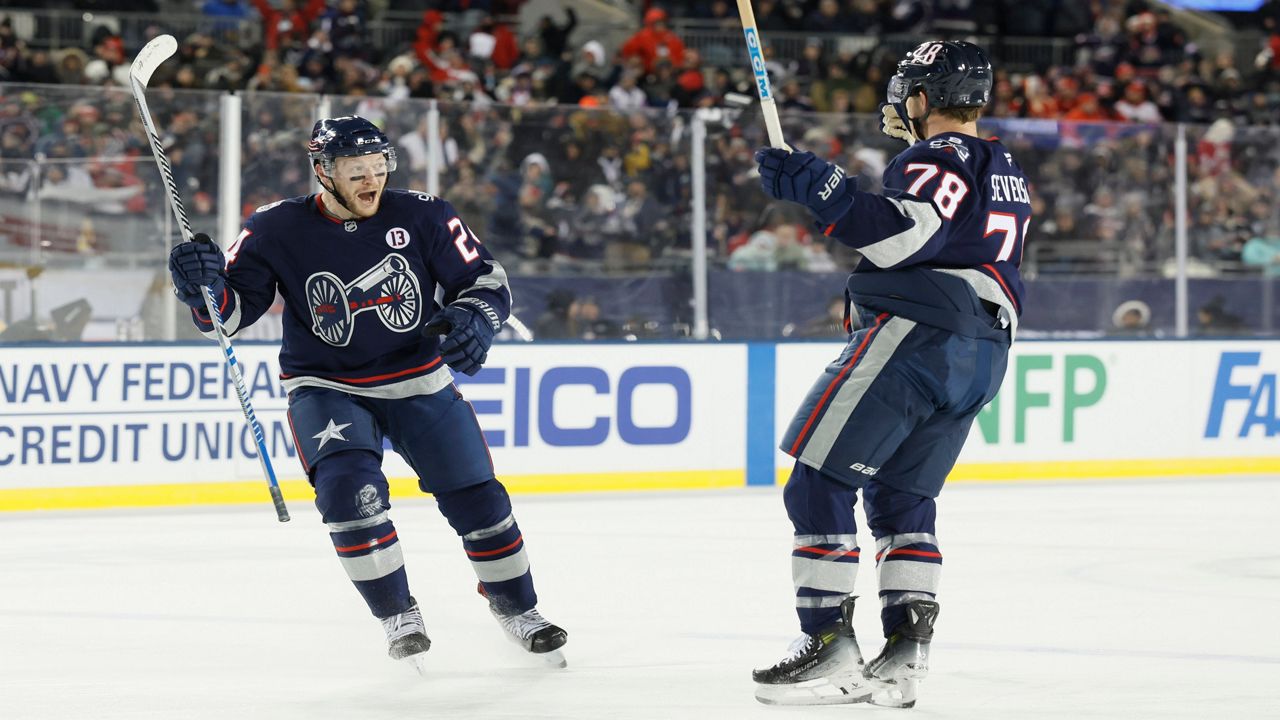 Columbus Blue Jackets' Dmitri Voronkov (10) returns to the bench after scoring during the first period of an NHL hockey game against the Pittsburgh Penguins in Pittsburgh, Tuesday, Jan. 7, 2025. (AP Photo/Gene J. Puskar)