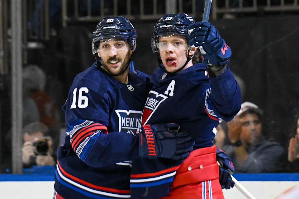 New York Rangers left wing Artemi Panarin (10) celebrates a goal with center Vincent Trocheck (16).Dennis Schneidler-Imagn Images