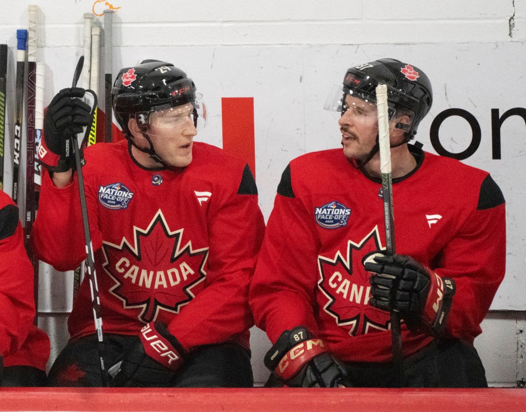 Nathan MacKinnon and Sidney Crosby of Team Canada.