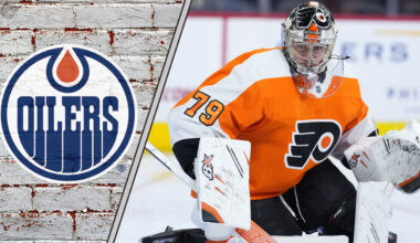 Goalie Carter Hart in his Philadelphia Flyers uniform, looking focused during a game, amidst swirling Edmonton Oilers trade rumors.