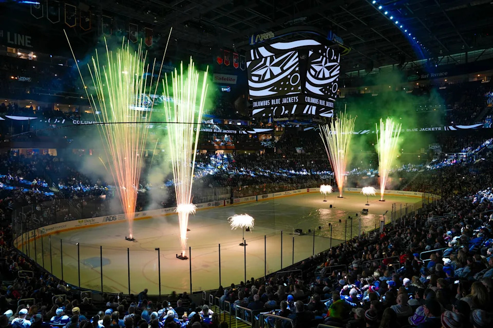 Fans watch the New Year’s Eve fireworks show after the game between the Columbus Blue Jackets and the Carolina Hurricanes at Nationwide Arena on Tuesday, Dec. 31, 2024 in Columbus, Ohio.