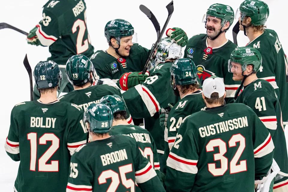 Minnesota Wild center Joel Eriksson Ek congratulates Minnesota Wild goaltender Marc-Andre Fleury after defeating the Anaheim Ducks in overtime at Xcel Energy Center in St. Paul, Minn., on April 15, 2025.Matt Blewett &sol; Imagn Images