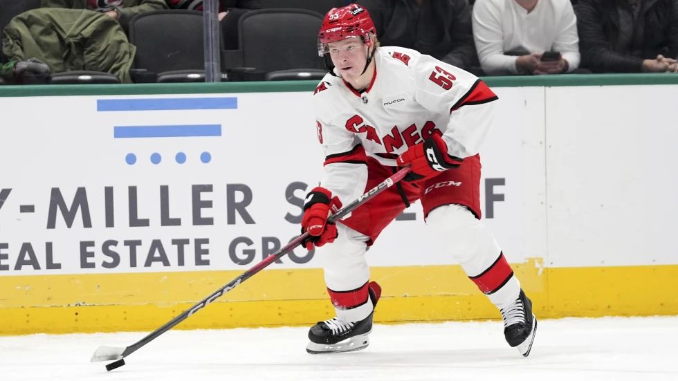Carolina Hurricanes right wing Jackson Blake controls the puck during an NHL hockey game against the Dallas Stars in Dallas, Jan. 21, 2025. (AP Photo/Tony Gutierrez, File)