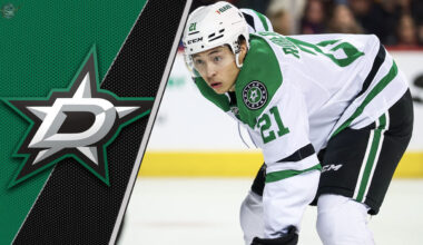 Dallas Stars forward Jason Robertson skates during an NHL game, looking focused amid recent NHL trade rumors.