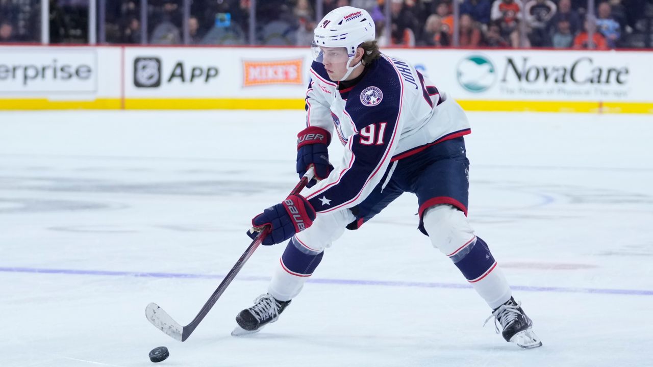 Columbus Blue Jackets' Kent Johnson plays during an NHL hockey game, Thursday, Jan. 4, 2024, in Philadelphia. (AP Photo/Matt Slocum)