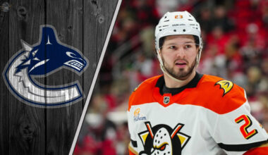 Anaheim Ducks forward Mason McTavish looks on during an NHL game, amidst recent NHL trade rumors linking him to the Vancouver Canucks.
