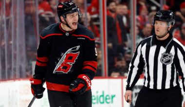 Mikko Rantanen (96) protests against a penalty with an official during the third period of an NHL hockey game against the Edmonton Oilers in Raleigh, N.C., Saturday, March 1, 2025. (AP Photo/Karl DeBlaker)