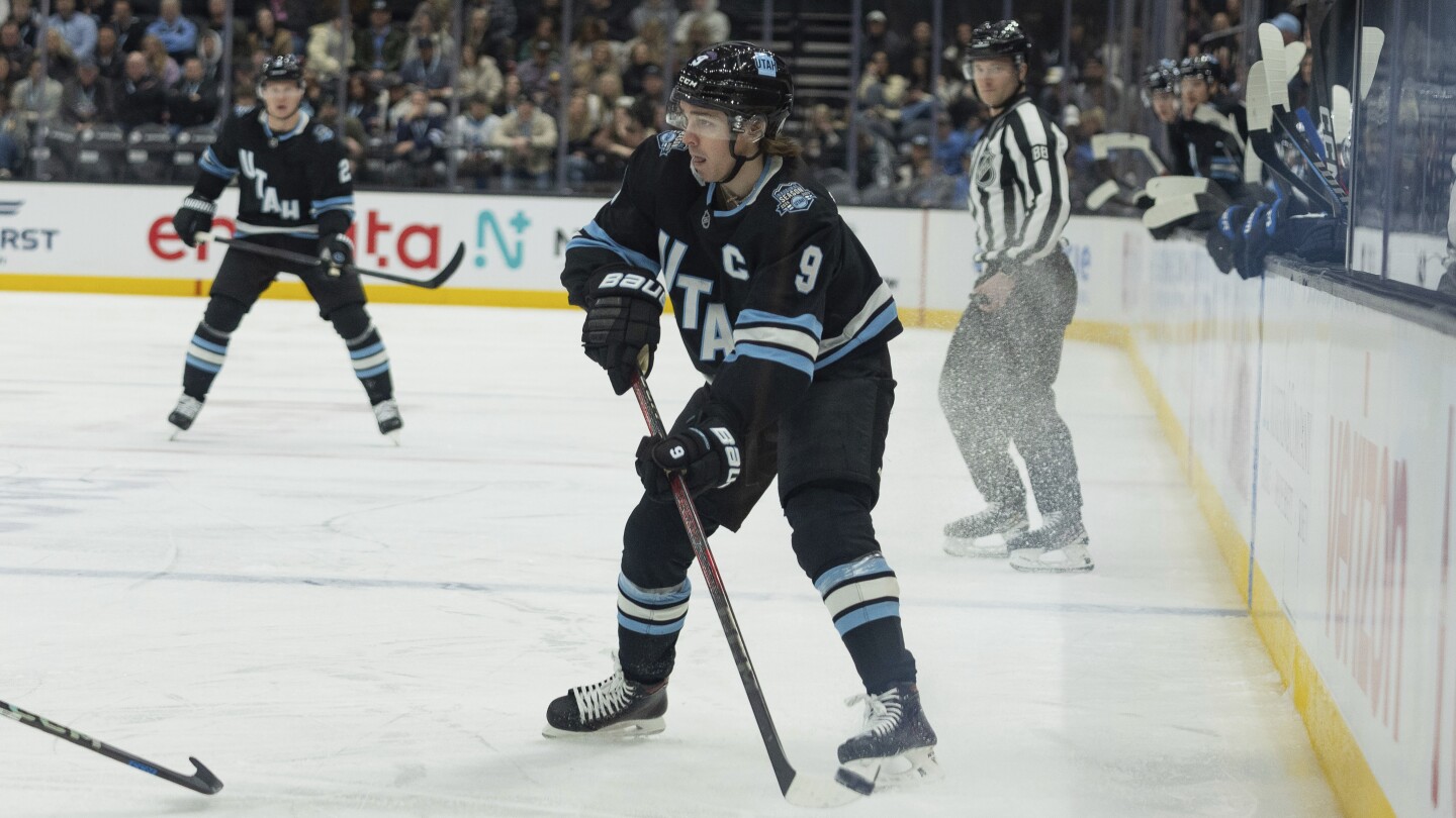 Utah's Clayton Keller exits in second period against Jets after getting struck in face with puck