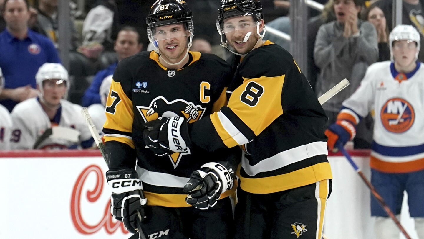 Crosby breaks Lemieux's Penguins career assists record in 3-2 victory over the Islanders