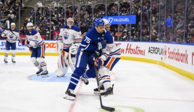 Oilers' Darnell Nurse left bloodied after hit to head from Maple Leafs' Reaves