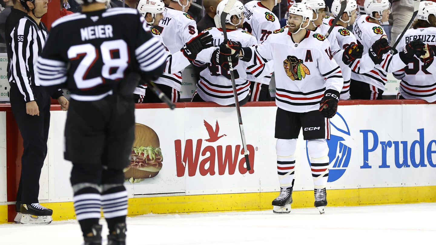 Jack Hughes helps the Devils rally for a 4-1 victory over the Blackhawks