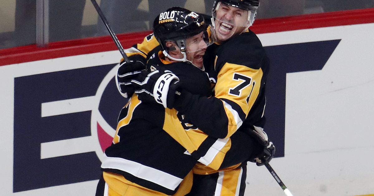 Crosby and Malkin have milestone nights in Sabres win