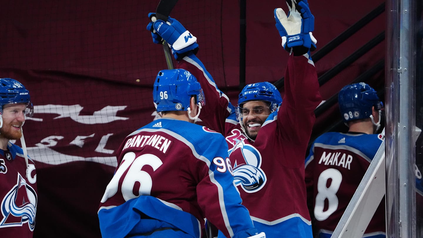 May 13, 2021; Denver, Colorado, USA; Colorado Avalanche right wing Mikko Rantanen (96) and center Pierre-Edouard Bellemare (41) celebrate defeating the Los Angeles Kings at Ball Arena. Mandatory Credit: Ron Chenoy-Imagn Images