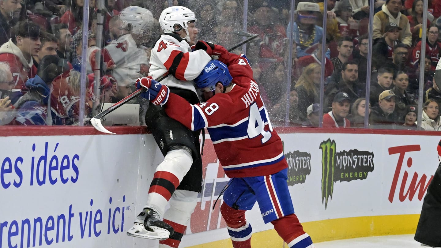 Montreal Canadiens defenseman Lane Hutson (48) checks New Jersey Devils defenseman Luke Hughes (43): Eric Bolte-Imagn Images
