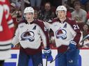 Cale Makar of the Colorado Avalanche with teammate Nathan MacKinnon.