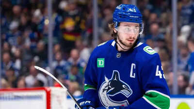 Vancouver Canucks’ identity at crossroads as Quinn Hughes trade talk intensifies with Devils showing strong interest