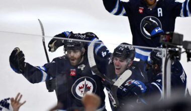Lowry scores late in 2OT to rally Jets to 4-3 win over Blues in Game 7 to advance to 2nd round