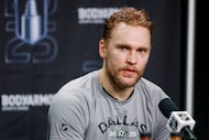 Dallas Stars right wing Mikko Rantanen listens to a question from a reporter after a...