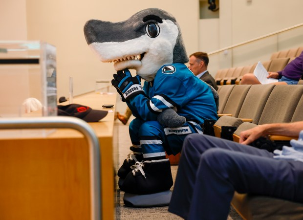 San Jose Sharks mascot S.J. Sharkie listens during the San...
