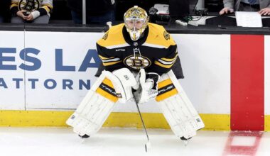 Boston Bruins goaltender Jeremy Swayman (1) stretches before an NHL hockey game against the Vegas Golden Knights, Saturday, Feb. 8, 2025, in Boston. (AP Photo/Mark Stockwell)