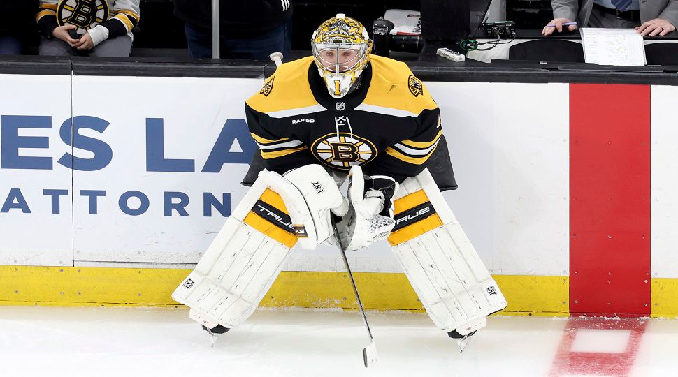 Boston Bruins goaltender Jeremy Swayman (1) stretches before an NHL hockey game against the Vegas Golden Knights, Saturday, Feb. 8, 2025, in Boston. (AP Photo/Mark Stockwell)