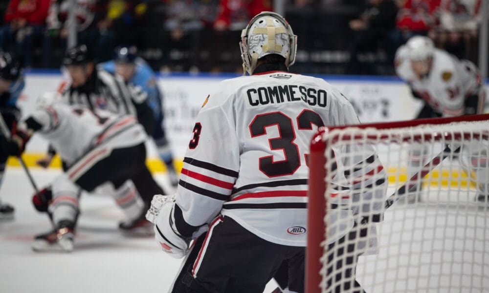 Drew Commesso #33 of the Rockford IceHogs takes in the game from the crease.