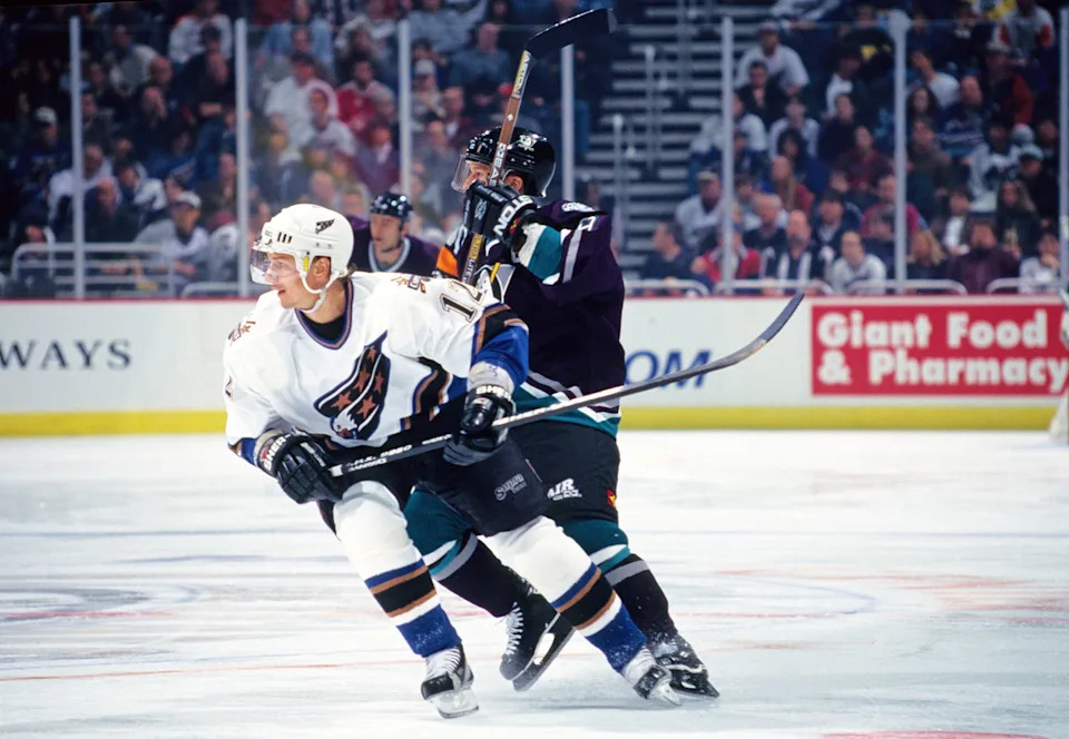 Unknown Date, 1998; Washington, DC, USA; FILE PHOTO; Washington Capitals right wing Peter Bondra (12) in action against Mighty Ducks of Anaheim left wing Paul Kariya (9) at the MCI Center. Mandatory Credit: Lou Capozzola-USA TODAY NETWORK