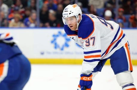 Mar 10, 2025; Buffalo, New York, USA; Edmonton Oilers center Connor McDavid (97) waits for the faceoff during the first period against the Buffalo Sabres at KeyBank Center. Mandatory Credit: Timothy T. Ludwig-Imagn Images