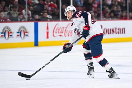 Nov 16, 2024; Montreal, Quebec, CAN; Columbus Blue Jackets right wing Kevin Labanc (62) plays the puck during the first period at Bell Centre. Mandatory Credit: David Kirouac-Imagn Images