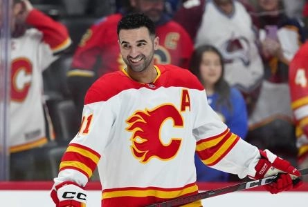 Mar 31, 2025; Denver, Colorado, USA; Calgary Flames center Nazem Kadri (91) before the game against the Colorado Avalanche at Ball Arena. Mandatory Credit: Ron Chenoy-Imagn Images