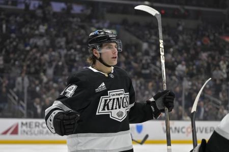 Mar 29, 2025; Los Angeles, California, USA; Los Angeles Kings right wing Alex Laferriere (14) reacts after scoring a goal in the second period against the Toronto Maple Leafs at Crypto.com Arena. Mandatory Credit: Jayne Kamin-Oncea-Imagn Images